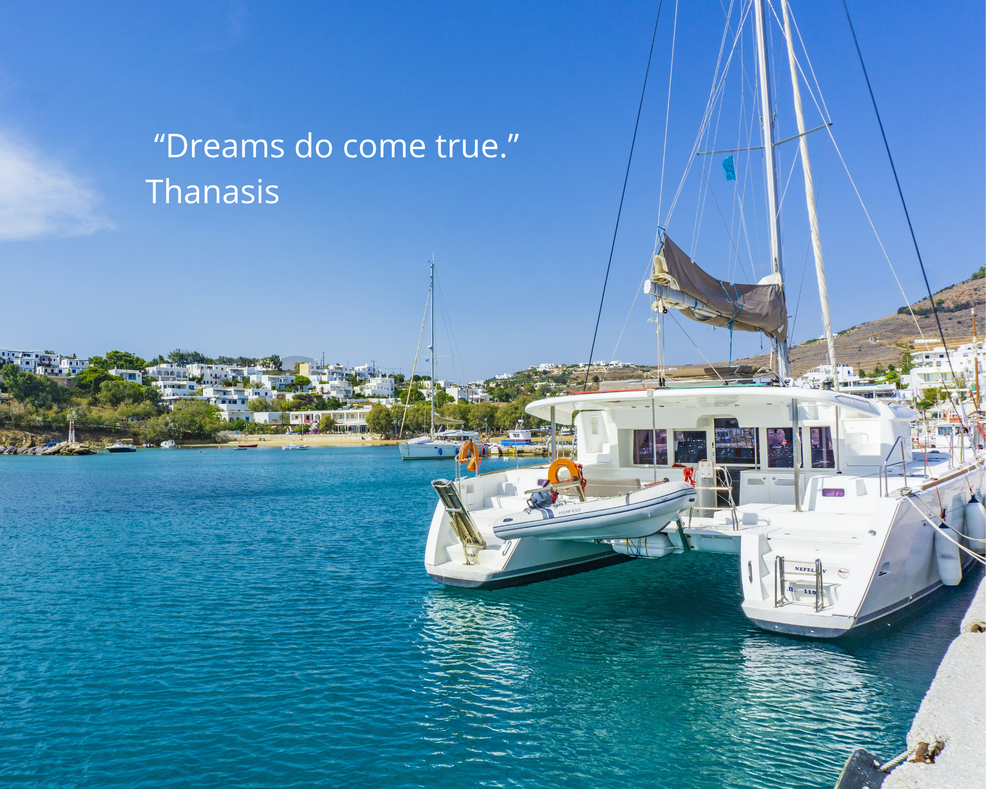 A luxury catamaran moored in a turquoise Greek bay - Monobrow Private Catamaran Charters