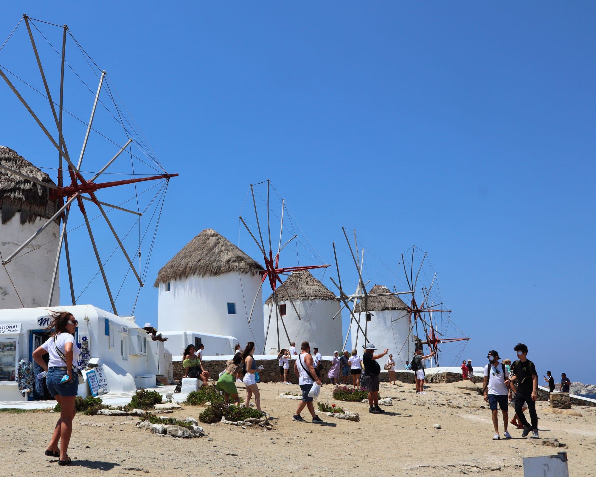 The windmills above Mykonos Town on a busy summer afternoon